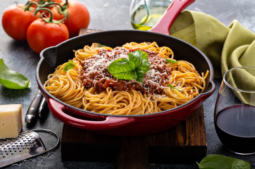 Spaghetti Bolognese in a cast iron pan